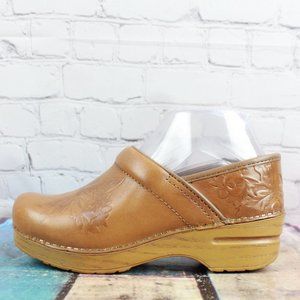 Dansko Tan Leather Embossed Wedge Clogs